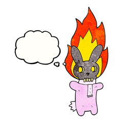 freehand drawn thought bubble textured cartoon flaming skull rabbit