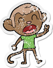 distressed sticker of a shouting cartoon monkey