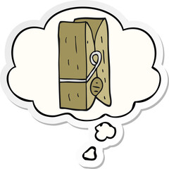 cartoon peg with thought bubble as a printed sticker