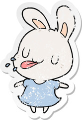 distressed sticker of a cartoon rabbit