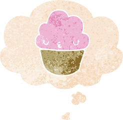 cartoon cupcake with face with thought bubble in grunge distressed retro textured style