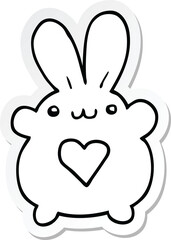 sticker of a cute cartoon rabbit with love heart