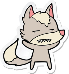 sticker of a cartoon wolf showing teeth