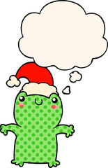 cute cartoon frog wearing christmas hat with thought bubble in comic book style