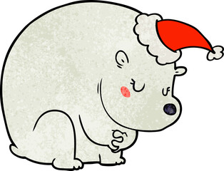 cute hand drawn textured cartoon of a polar bear wearing santa hat