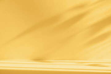 Abstract yellow color gradient studio background for product presentation. Empty room with shadows...
