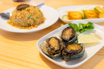 Chinese style seafood arranged dishes in restaurant