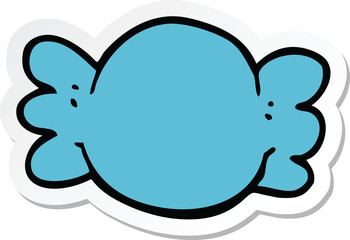 sticker of a cartoon wrapped candy