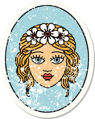 distressed sticker tattoo in traditional style of a maiden with crown of flowers