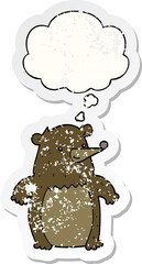 cartoon bear with thought bubble as a distressed worn sticker