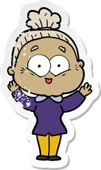 distressed sticker of a cartoon happy old woman