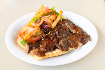 Meatball between bread (Turkish name : ekmek arasi kofte ). Izgara kofte