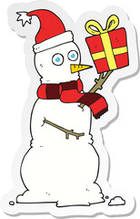 sticker of a cartoon snowman holding present