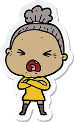 Obraz premium sticker of a cartoon angry old woman