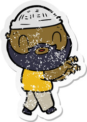 distressed sticker of a cartoon bearded man