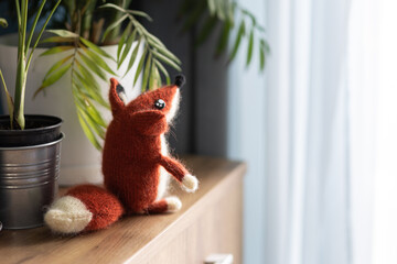 Toy knitted red fox