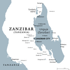 Zanzibar Island, Unguja, Tanzania, gray political map. Largest, most populated island of the Zanzibar Archipelago in the Indian Ocean separated from the African mainland. Isolated illustration. Vector - obrazy, fototapety, plakaty