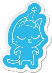 calm quirky cartoon  sticker of a cat wearing santa hat