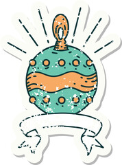 worn old sticker of a tattoo style christmas ornament