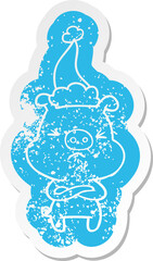 quirky cartoon distressed sticker of a angry pig wearing santa hat