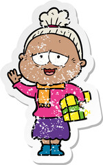 distressed sticker of a cartoon happy old lady