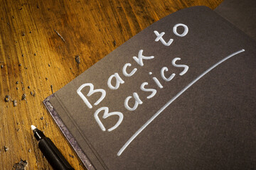 Notebook with handwritten inscription back to basics.