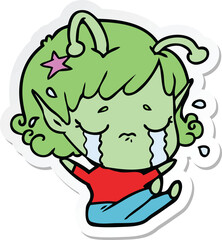 sticker of a cartoon crying alien girl