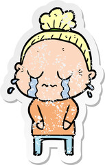 Obraz premium distressed sticker of a cartoon crying old lady