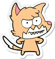 sticker of a cartoon grinning fox