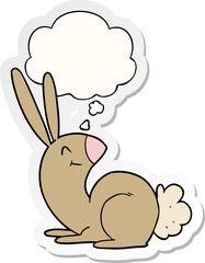 cute cartoon rabbit with thought bubble as a printed sticker