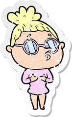 distressed sticker of a cartoon woman wearing glasses