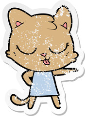 Obraz na płótnie Canvas distressed sticker of a cartoon cat pointing