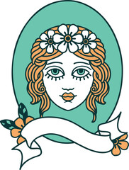 traditional tattoo with banner of a maiden with flowers in her hair