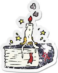 distressed sticker of a cartoon spooky spellbook