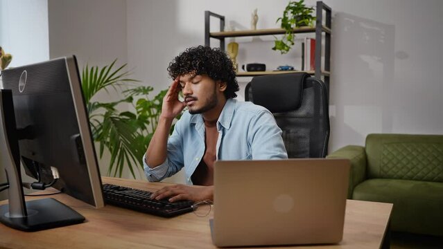 Frustrated programmer tries to find bug in source code