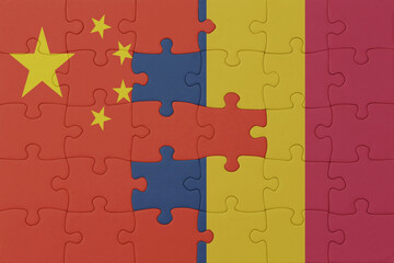 puzzle with the national flag of chad and china . macro.concept.