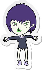 sticker of a cartoon vampire girl