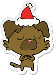 hand drawn sticker cartoon of a dog wearing santa hat