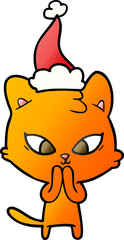 cute hand drawn gradient cartoon of a cat wearing santa hat
