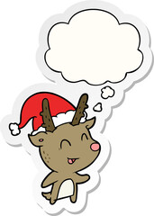 cartoon christmas reindeer with thought bubble as a printed sticker