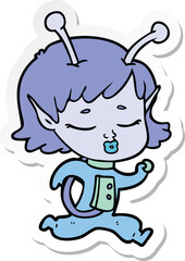 sticker of a cartoon alien girl