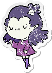 distressed sticker of a cartoon vampire