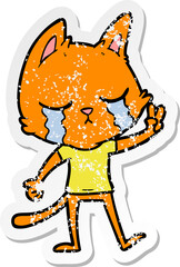 distressed sticker of a crying cartoon cat