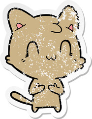 distressed sticker of a cartoon happy cat