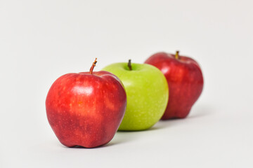 Green apples and red apples are nutritious,select focus.