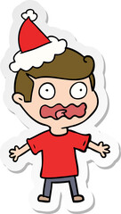hand drawn sticker cartoon of a man totally stressed out wearing santa hat