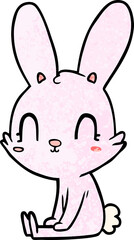 Obraz na płótnie Canvas cute cartoon rabbit sitting