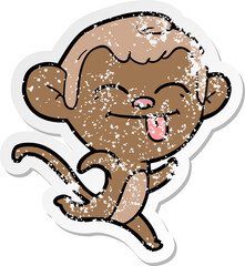 distressed sticker of a funny cartoon monkey