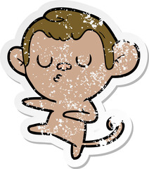 distressed sticker of a cartoon monkey
