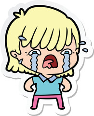 sticker of a cartoon girl crying